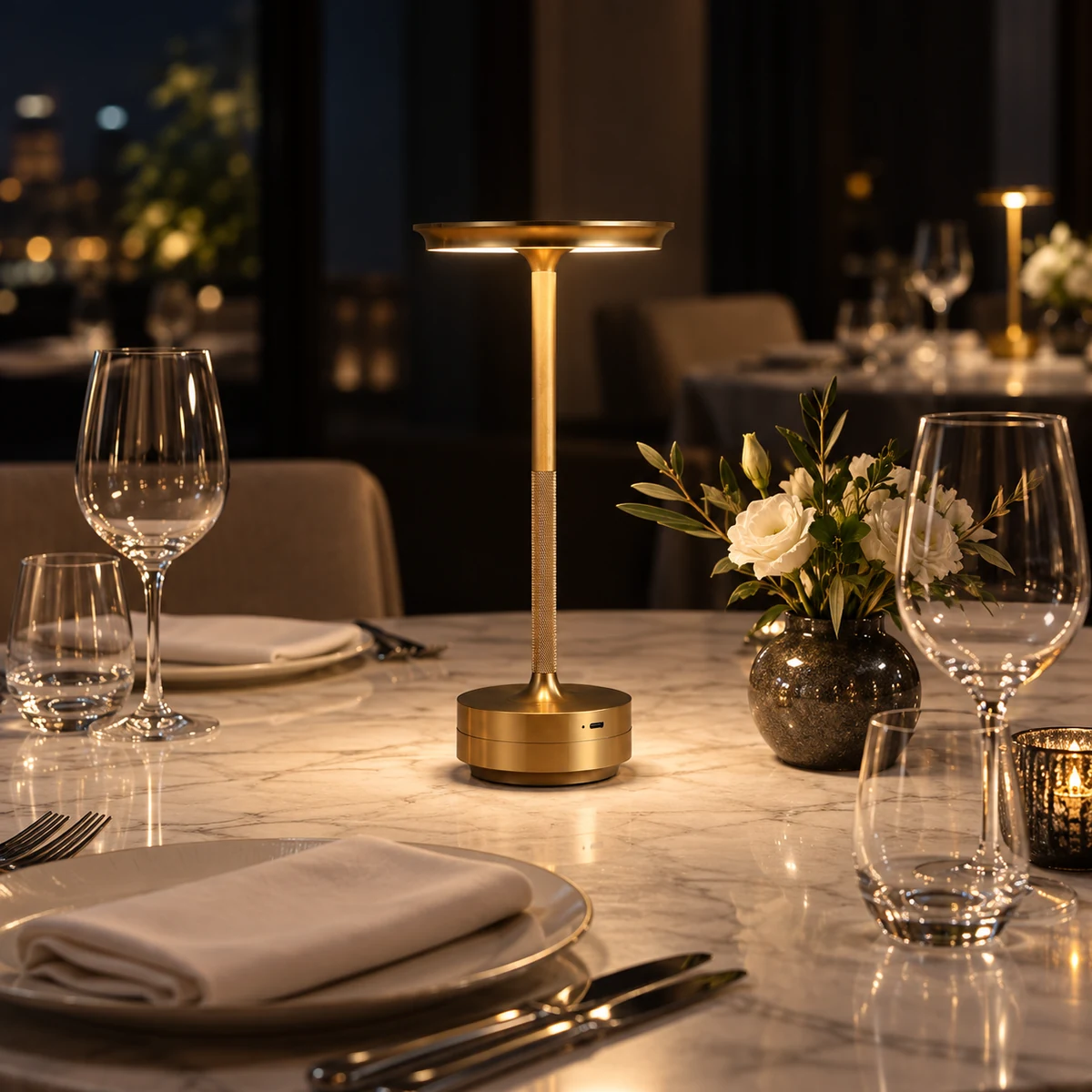 Elegance cordless table lamp in brushed gold finish on a clean background Elegance cordless table lamp in brushed gold finish on a clean background